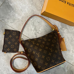 Leather Monogram Bucket Mini Pouch Bag